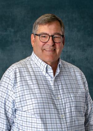 James P. Cravens, Chairman of the Board